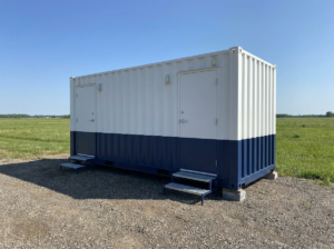 Container portable restroom block at an event field
